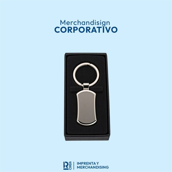 LLAVERO METÁLICO CON CURVAS DOBLE CARA